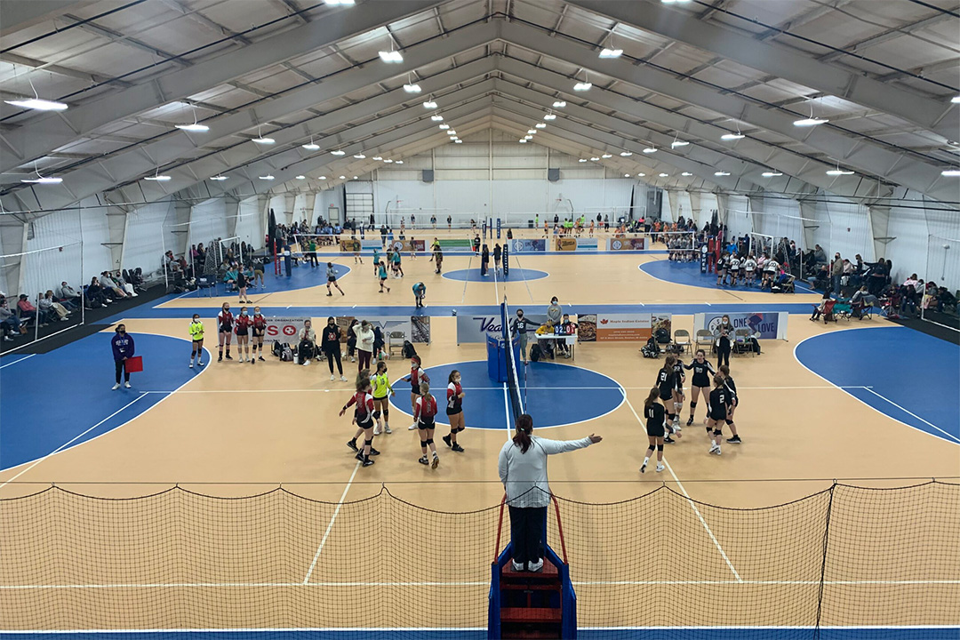 A volleyball tournament going on in Goshen, Indiana inside of a sports complex